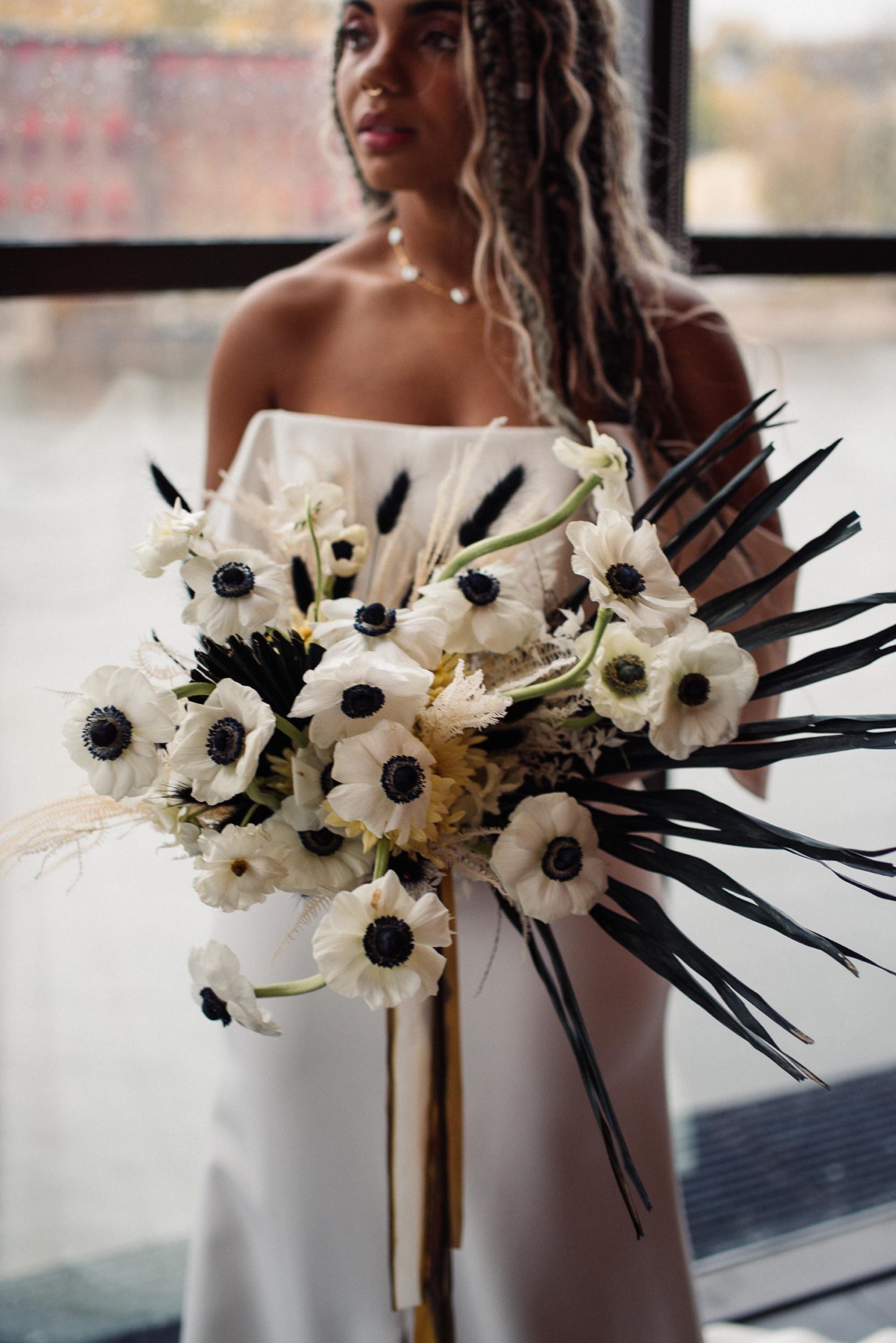 Anemone and feather bridal bouquet by Nectar & Root