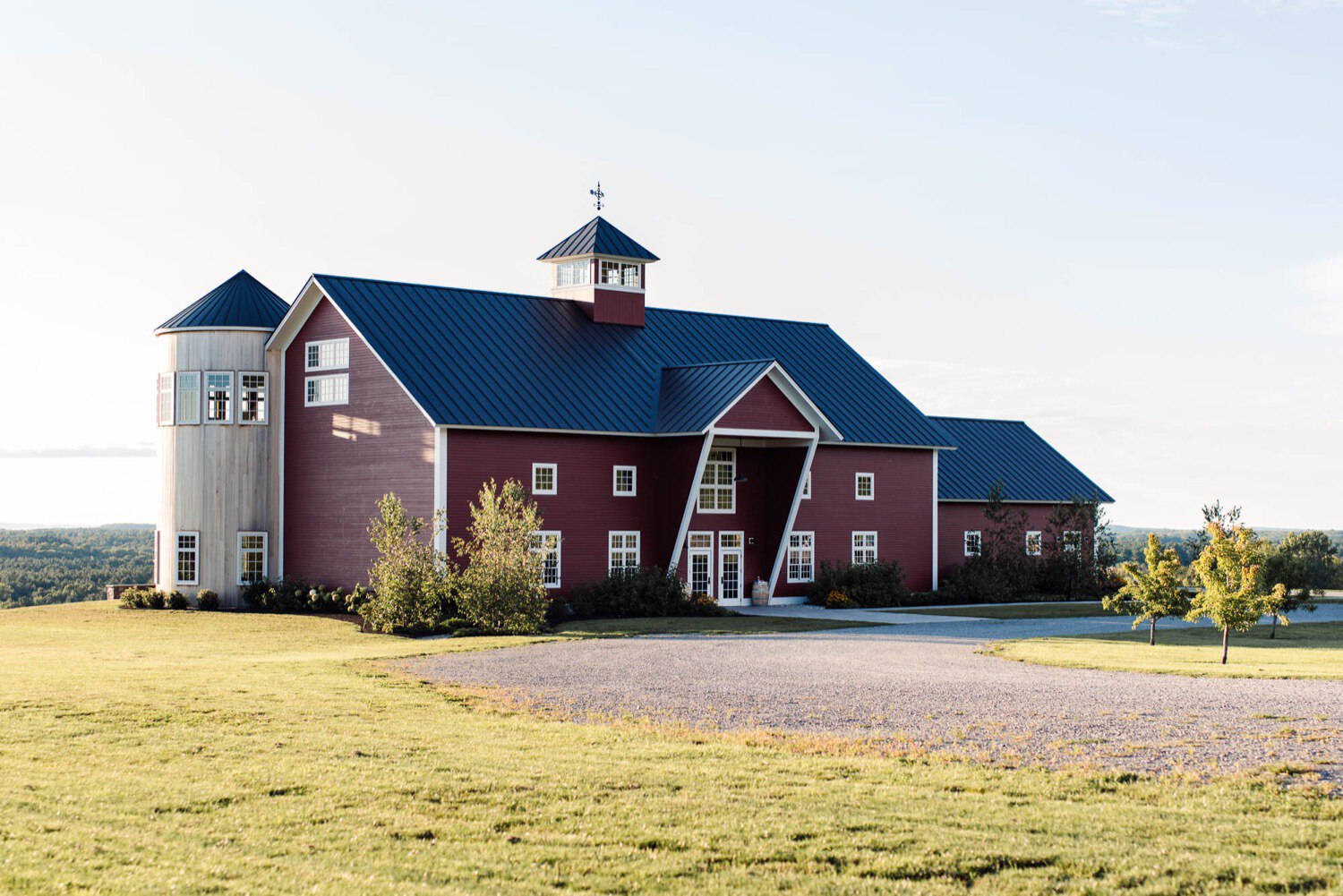 Facade of Maquam Barn and Winery at sunset following summer wedding