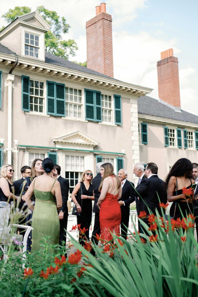 Step into this timeless black tie wedding at Hildene, the Lincoln Family Home in Manchester, Vermont cocktail hour in the gardens