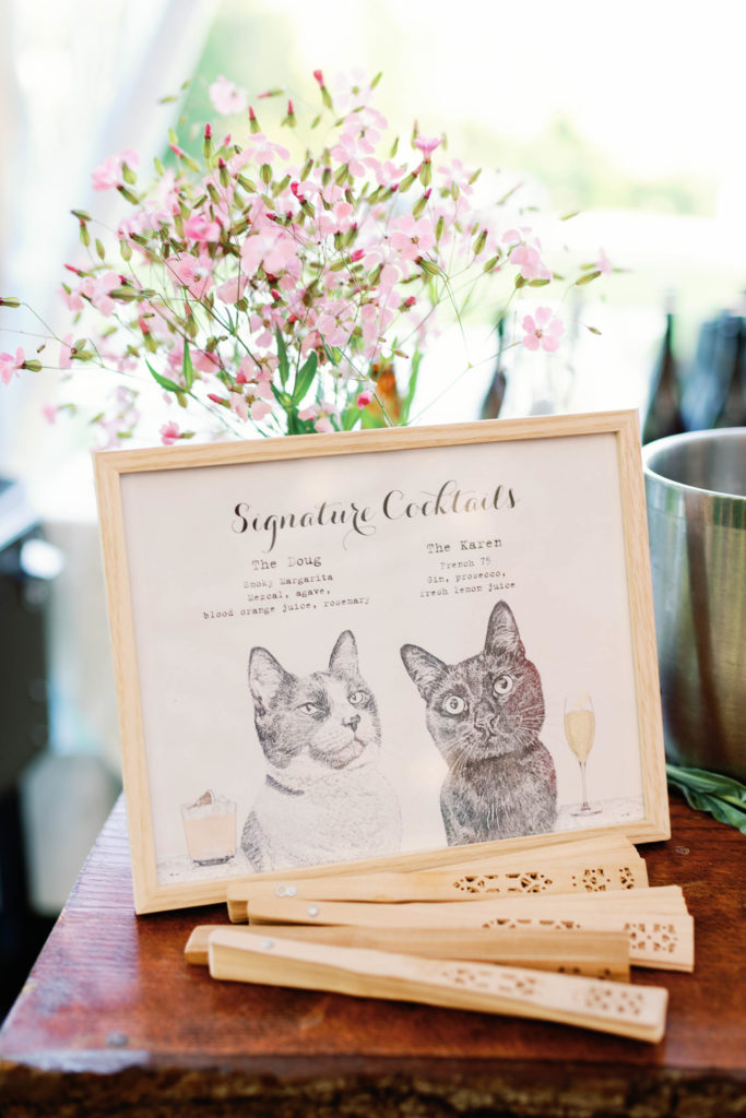 signature cocktails menu with cats and pink flowers