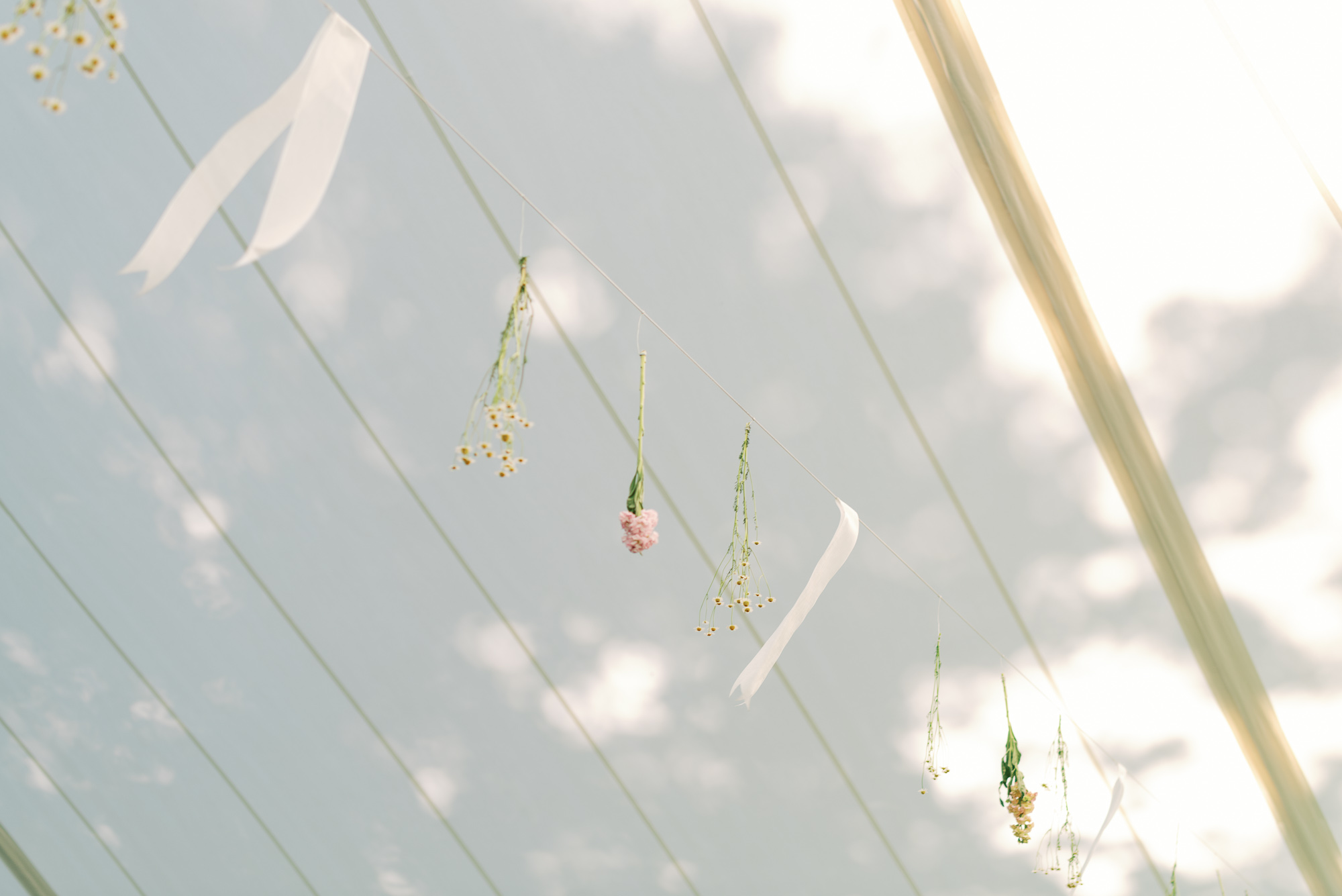 minimalist modern wedding tent floral decor by nectar and root