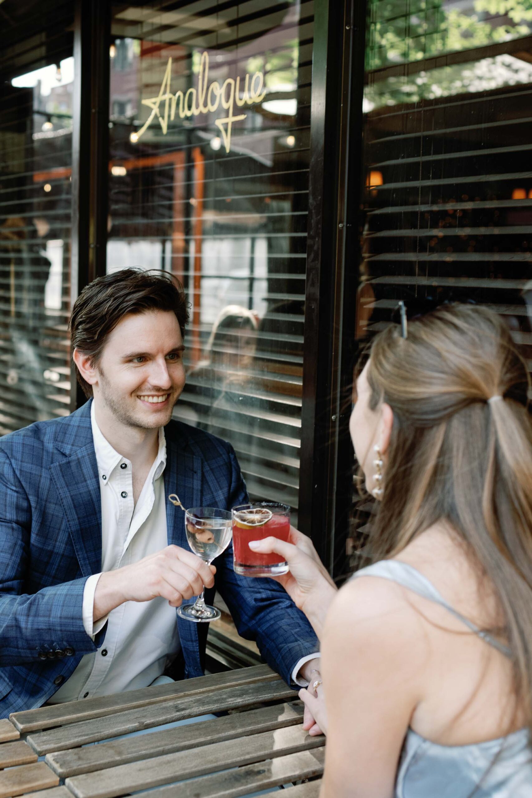 couple cheers' cocktails at analogue nyc bar