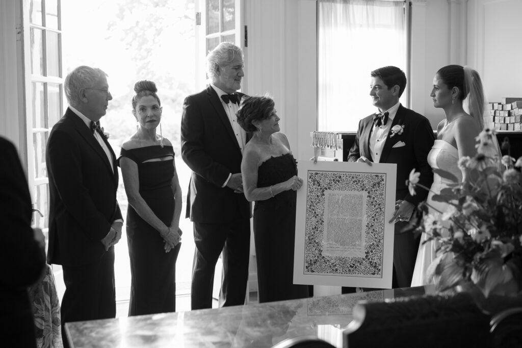Step into this timeless black tie wedding at Hildene, the Lincoln Family Home in Manchester, Vermont ketubah signing