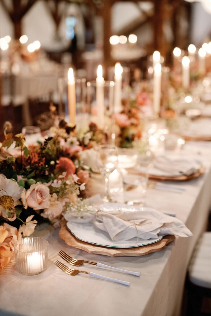 riverside farm vermont wedding in the fall with birds of a flower design reception barn