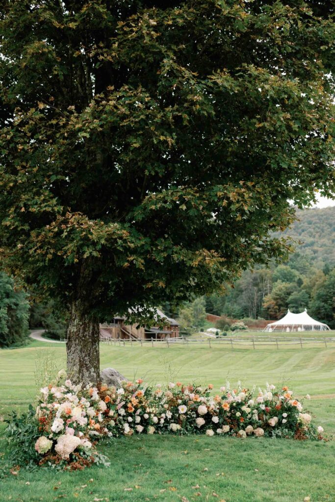 riverside farm vermont wedding in the fall with birds of a flower design