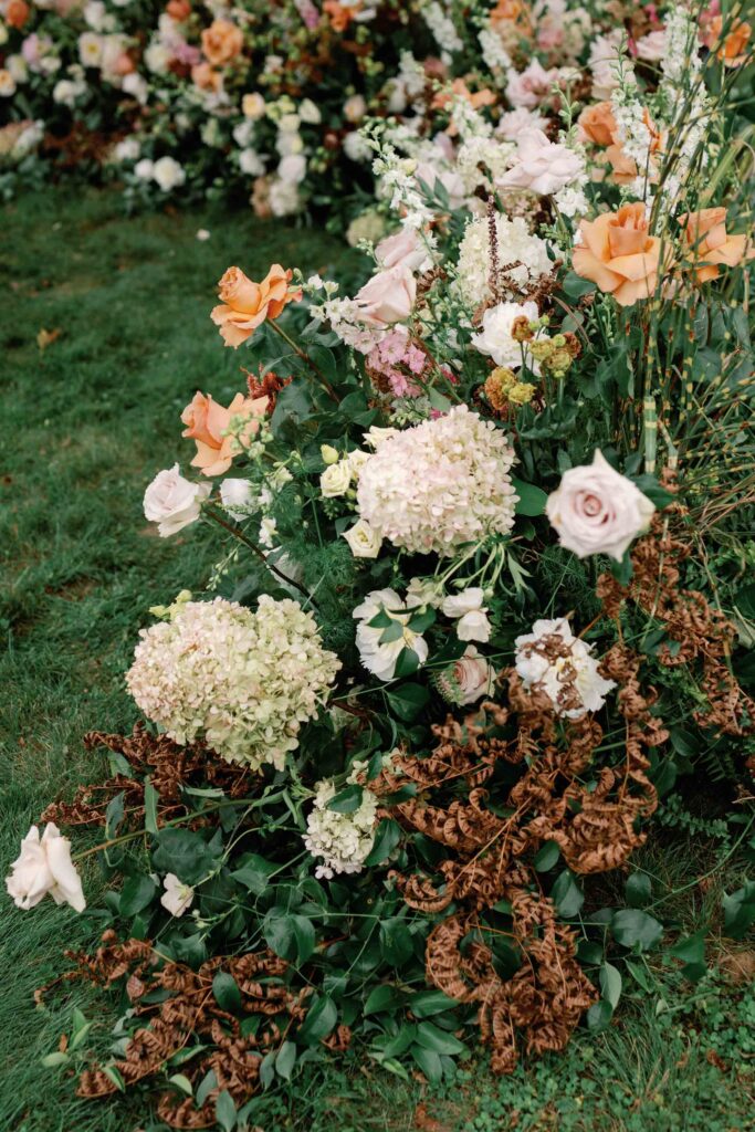 riverside farm vermont wedding in the fall with birds of a flower design