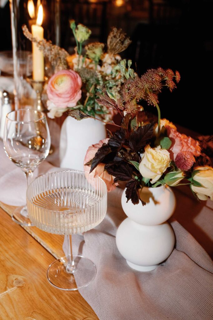 riverside farm vermont wedding in the fall with birds of a flower design reception barn