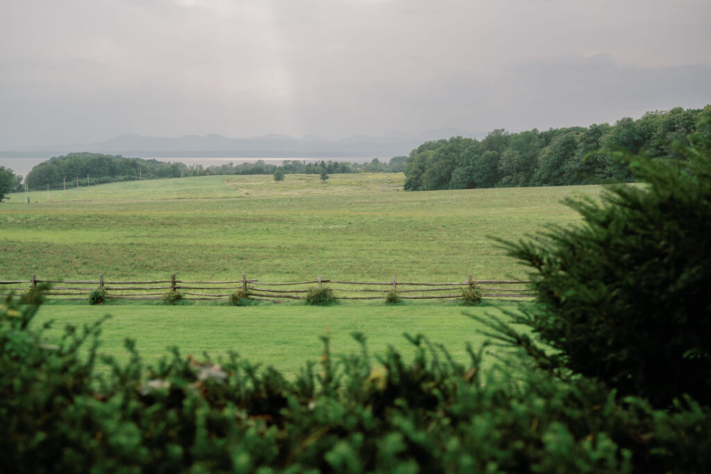 A black-tie Vermont wedding with a Nancy Meyers aesthetic at the historic Shelburne Museum Brick House with Personal notes for every guest, espresso martinis + churros, and sweeping lake views—this one’s for the romantics