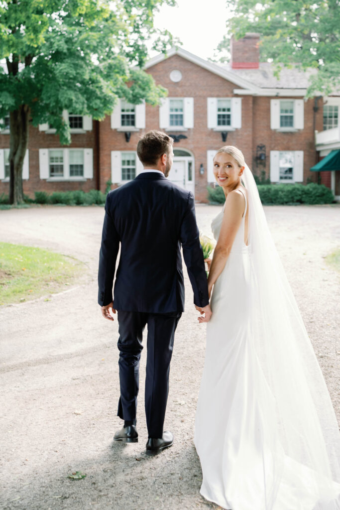 A black-tie Vermont wedding with a Nancy Meyers aesthetic at the historic Shelburne Museum Brick House with Personal notes for every guest, espresso martinis + churros, and sweeping lake views—this one’s for the romantics