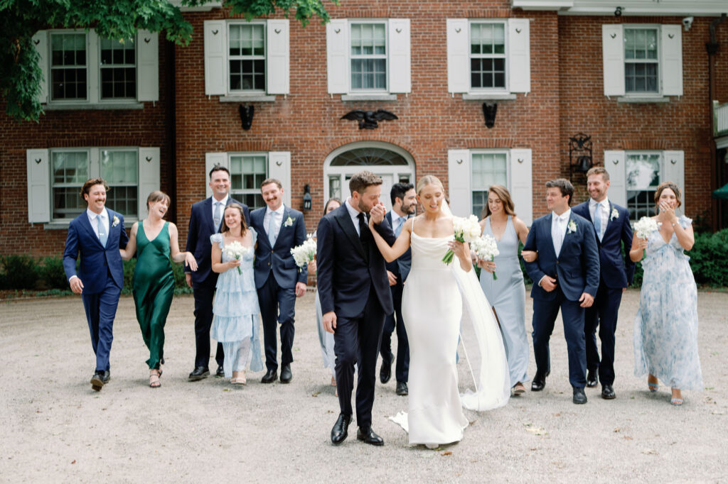 A black-tie Vermont wedding with a Nancy Meyers aesthetic at the historic Shelburne Museum Brick House with Personal notes for every guest, espresso martinis + churros, and sweeping lake views—this one’s for the romantics