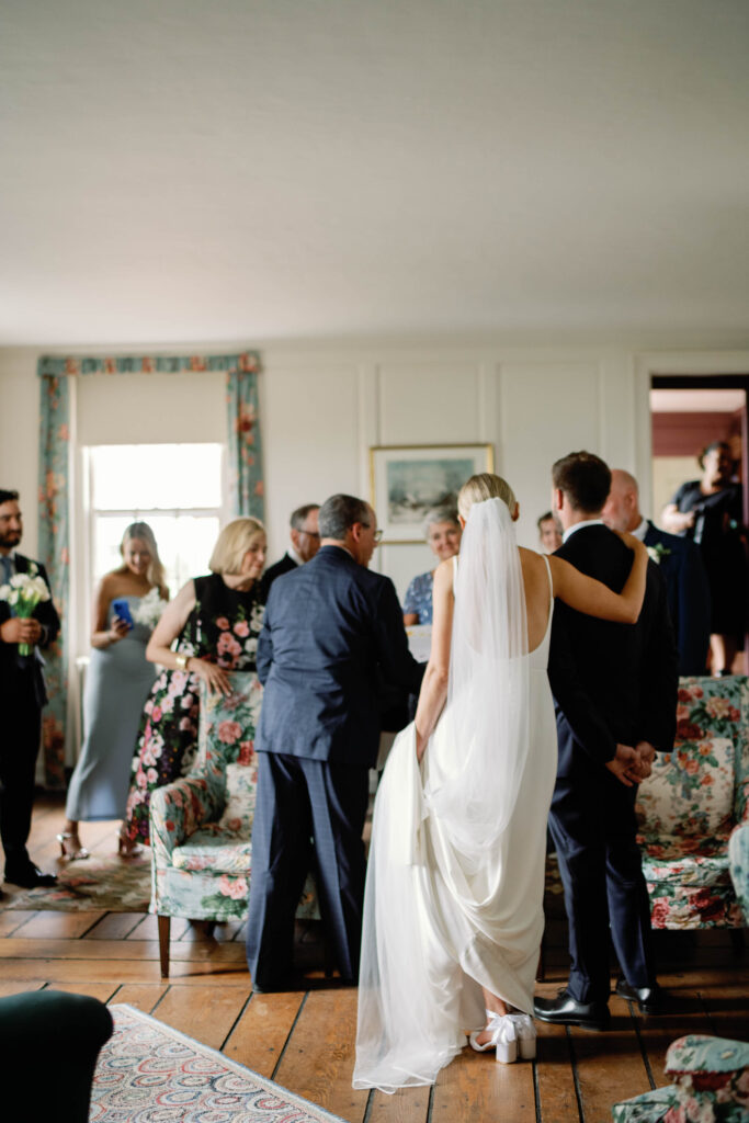 A black-tie Vermont wedding with a Nancy Meyers aesthetic at the historic Shelburne Museum Brick House with Personal notes for every guest, espresso martinis + churros, and sweeping lake views—this one’s for the romantics
