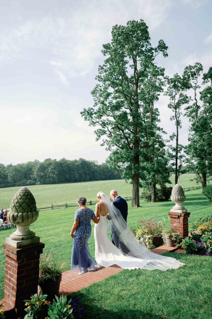 A black-tie Vermont wedding with a Nancy Meyers aesthetic at the historic Shelburne Museum Brick House with Personal notes for every guest, espresso martinis + churros, and sweeping lake views—this one’s for the romantics