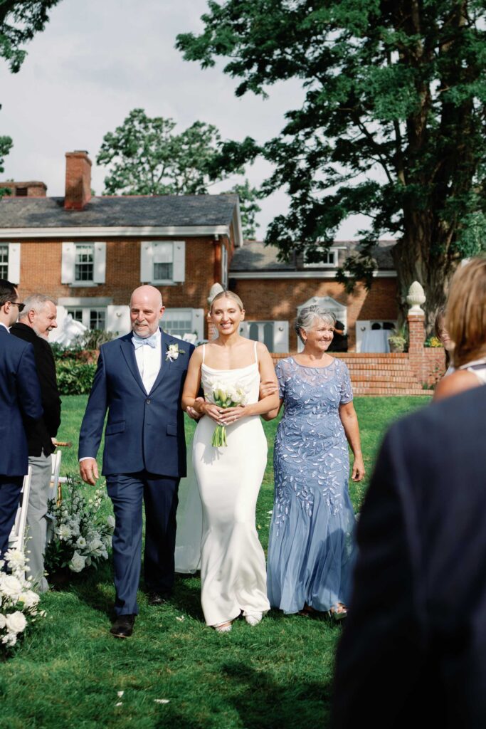 A black-tie Vermont wedding with a Nancy Meyers aesthetic at the historic Shelburne Museum Brick House with Personal notes for every guest, espresso martinis + churros, and sweeping lake views—this one’s for the romantics