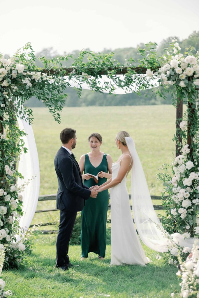 A black-tie Vermont wedding with a Nancy Meyers aesthetic at the historic Shelburne Museum Brick House with Personal notes for every guest, espresso martinis + churros, and sweeping lake views—this one’s for the romantics ceremony