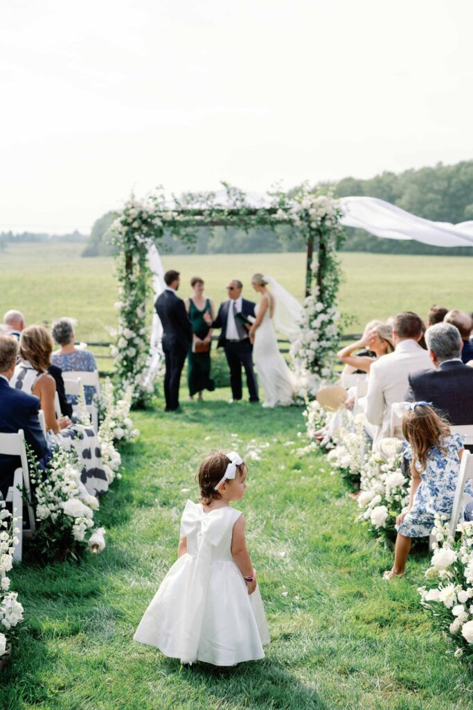 A black-tie Vermont wedding with a Nancy Meyers aesthetic at the historic Shelburne Museum Brick House with Personal notes for every guest, espresso martinis + churros, and sweeping lake views—this one’s for the romantics