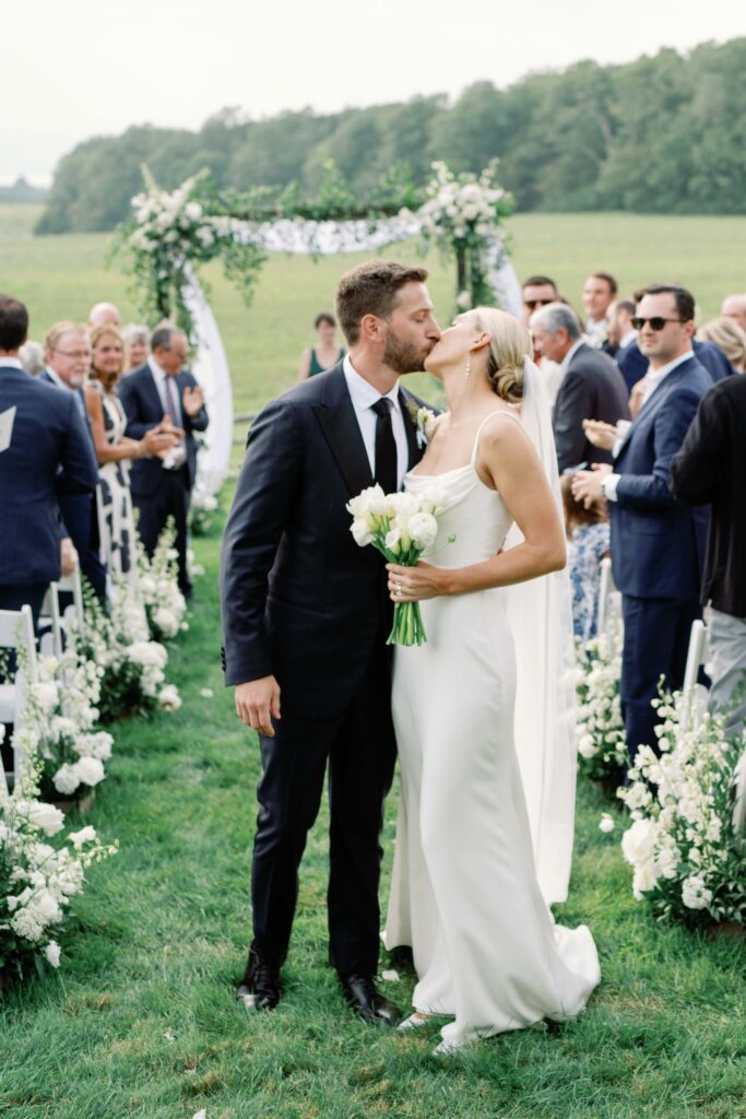 A black-tie Vermont wedding with a Nancy Meyers aesthetic at the historic Shelburne Museum Brick House with Personal notes for every guest, espresso martinis + churros, and sweeping lake views—this one’s for the romantics