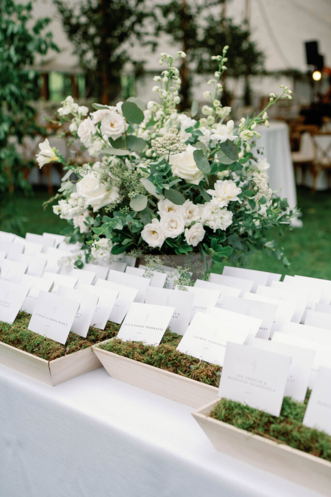 A black-tie Vermont wedding with a Nancy Meyers aesthetic at the historic Shelburne Museum Brick House with Personal notes for every guest, espresso martinis + churros, and sweeping lake views—this one’s for the romantics escort cards