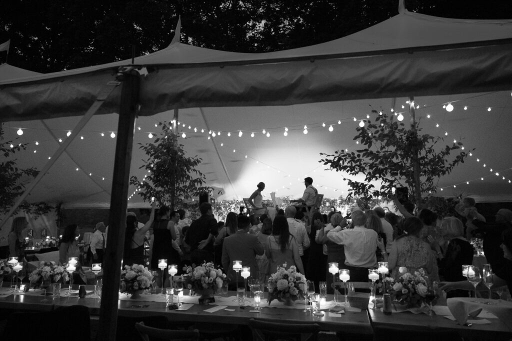 A black-tie Vermont wedding with a Nancy Meyers aesthetic at the historic Shelburne Museum Brick House reception tent