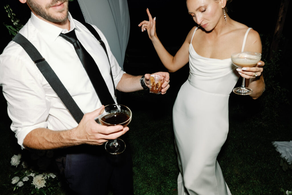 A black-tie Vermont wedding with a Nancy Meyers aesthetic at the historic Shelburne Museum Brick House with Personal notes for every guest, espresso martinis + churros, and sweeping lake views